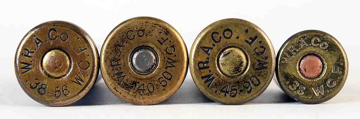 Winchester began by headstamping its cartridges simply with the caliber and WCF, such as the round at far right. Then, through their other innovations, they followed caliber with powder weight and then WCF.